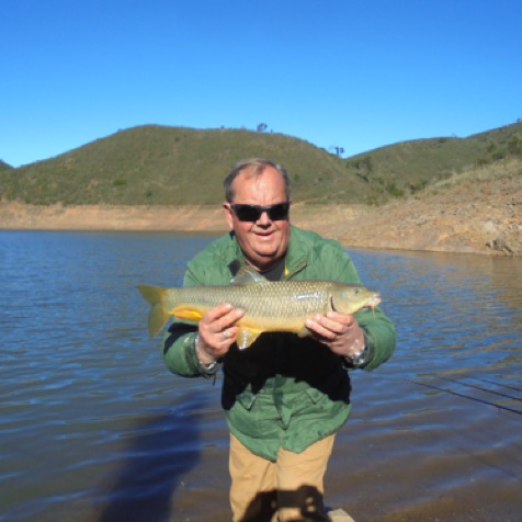 Gary Spencer with an Algarve barbel Gary Spencer with an Algarve barbel